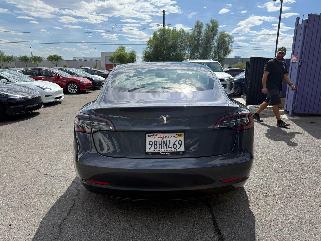 used 2022 Tesla Model 3 car, priced at $19,999