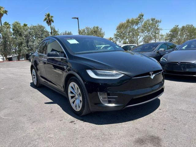 used 2018 Tesla Model X car, priced at $15,499