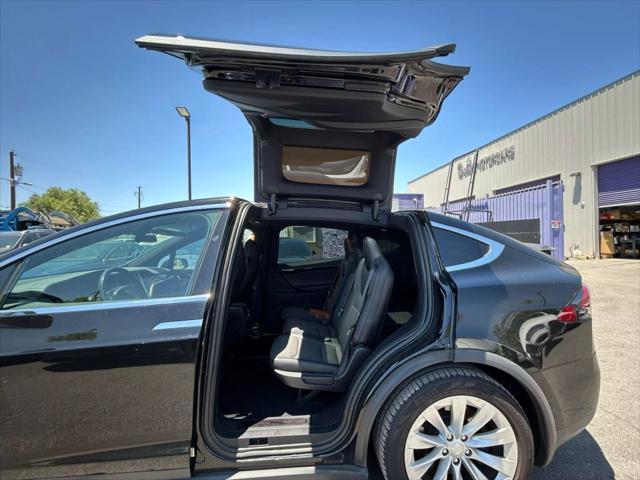 used 2018 Tesla Model X car, priced at $15,499