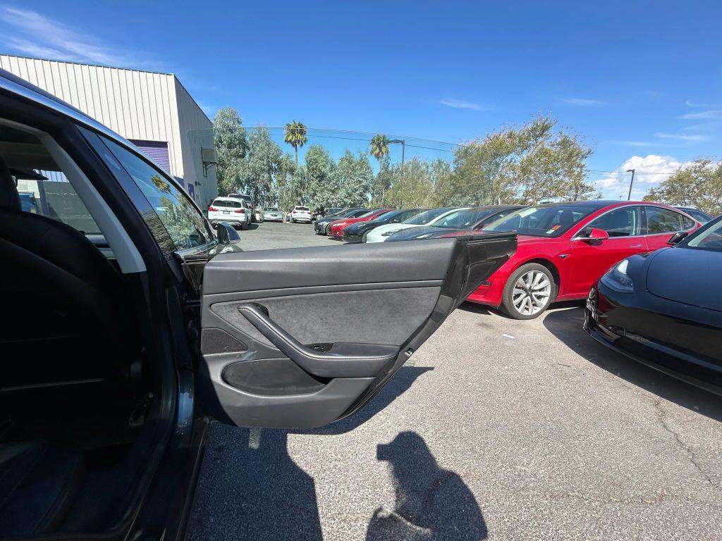 used 2018 Tesla Model 3 car, priced at $17,999