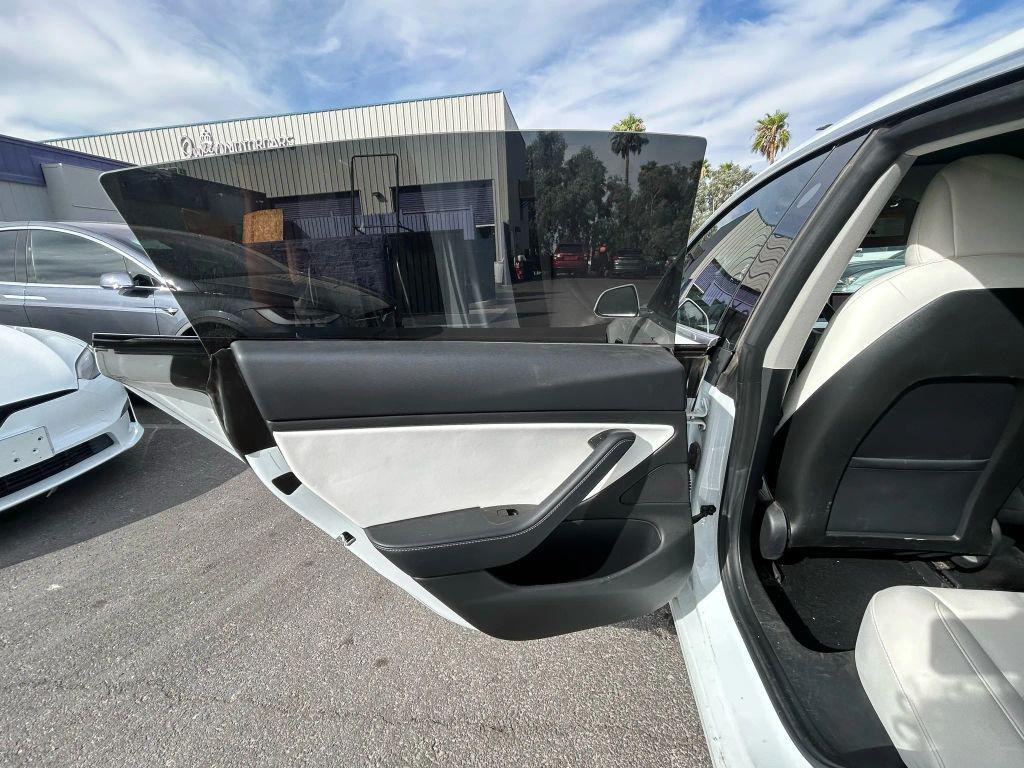 used 2018 Tesla Model 3 car, priced at $15,999