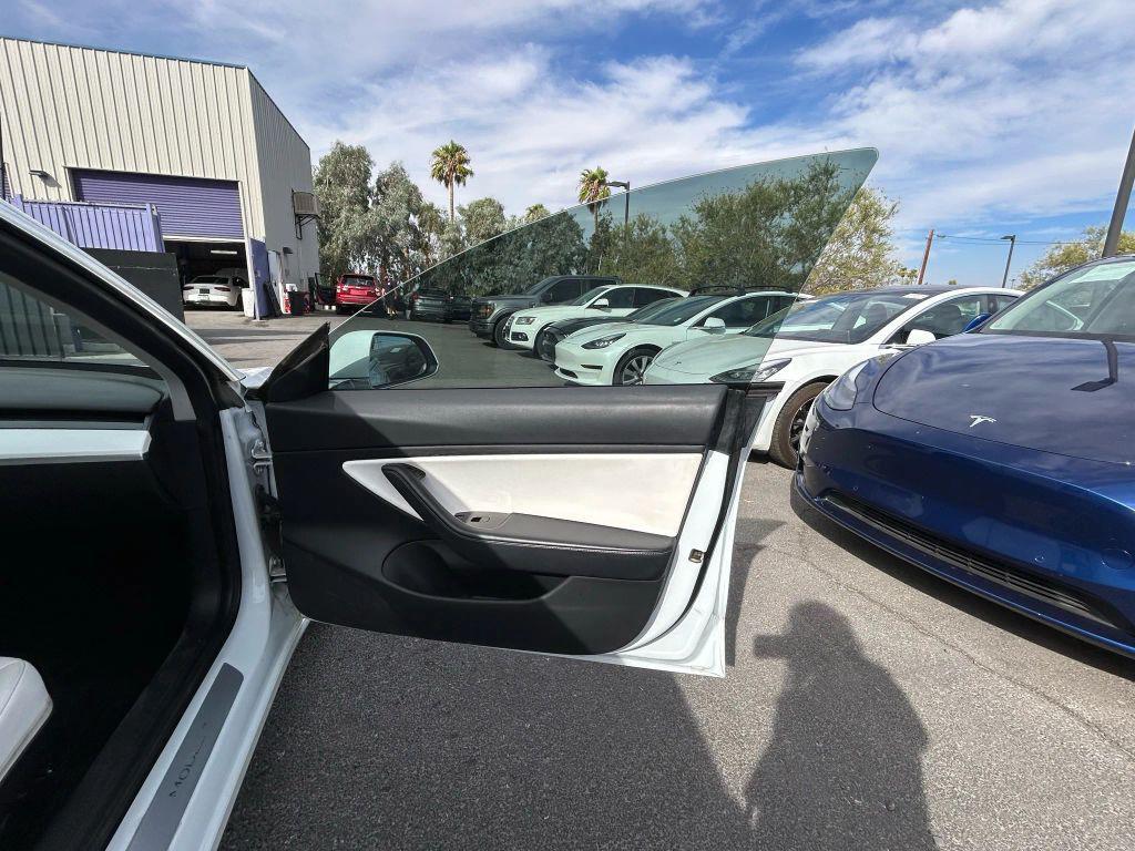 used 2018 Tesla Model 3 car, priced at $15,999