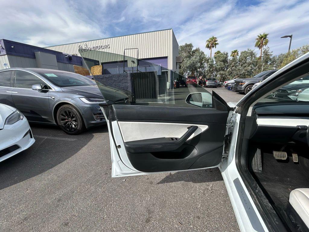 used 2018 Tesla Model 3 car, priced at $15,999
