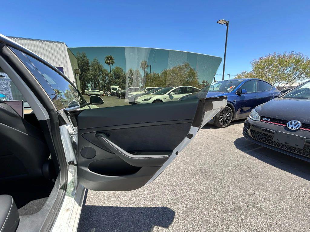 used 2022 Tesla Model 3 car, priced at $19,999