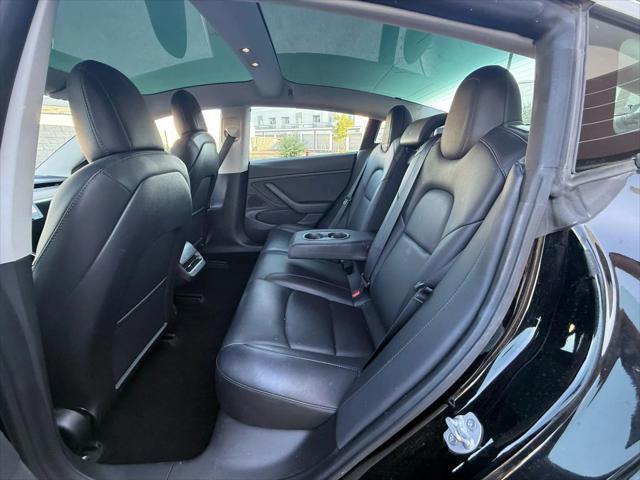 used 2018 Tesla Model 3 car, priced at $13,999