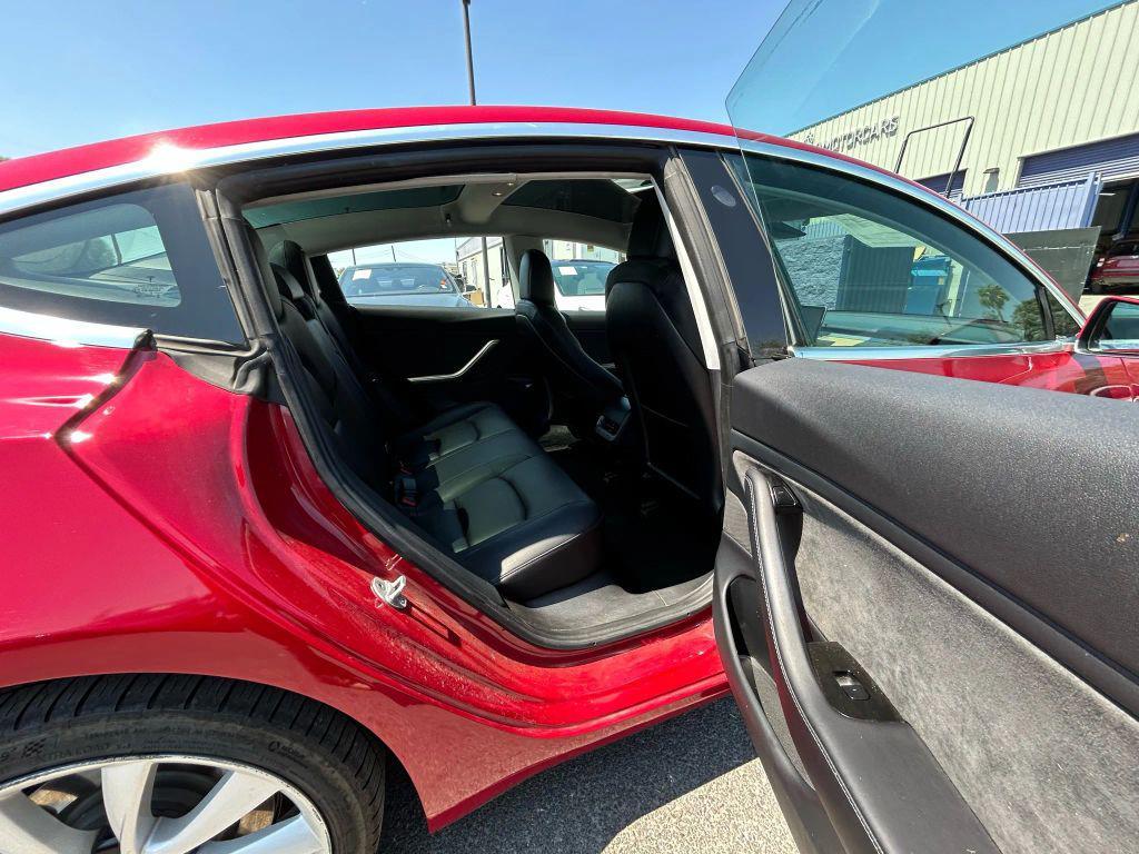 used 2018 Tesla Model 3 car, priced at $14,999