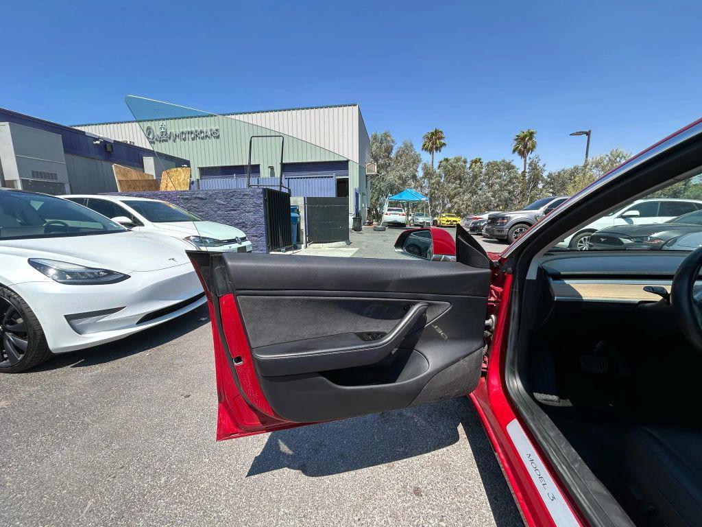 used 2018 Tesla Model 3 car, priced at $14,999