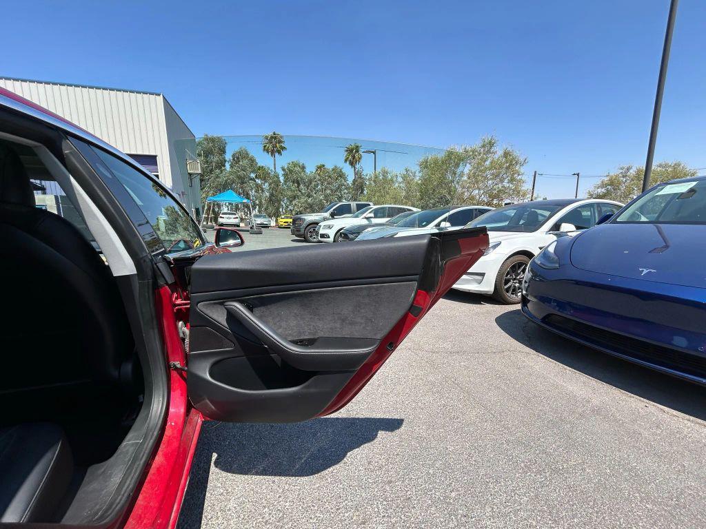 used 2018 Tesla Model 3 car, priced at $14,999