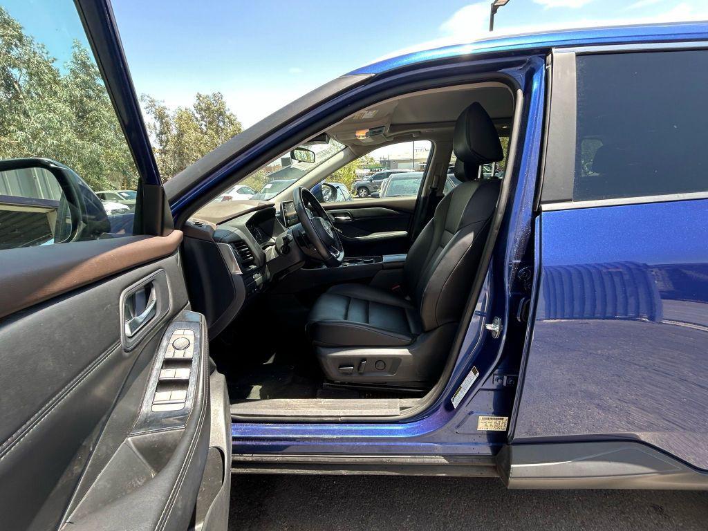 used 2023 Nissan Rogue car, priced at $14,999