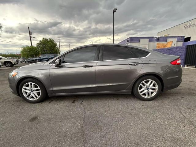 used 2014 Ford Fusion car, priced at $4,999