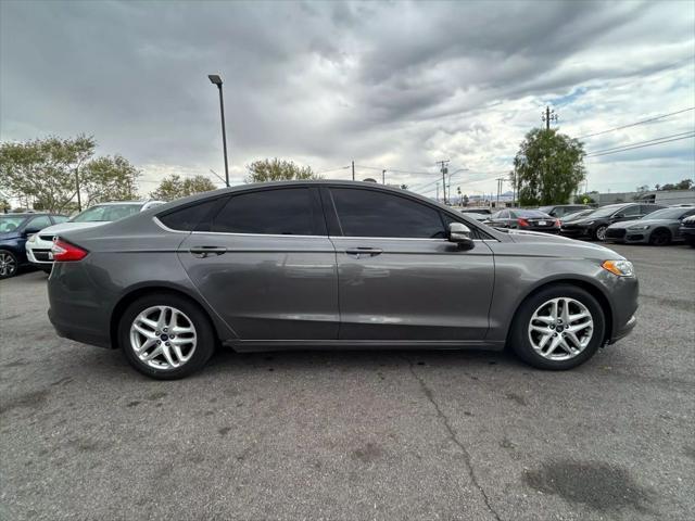 used 2014 Ford Fusion car, priced at $4,999