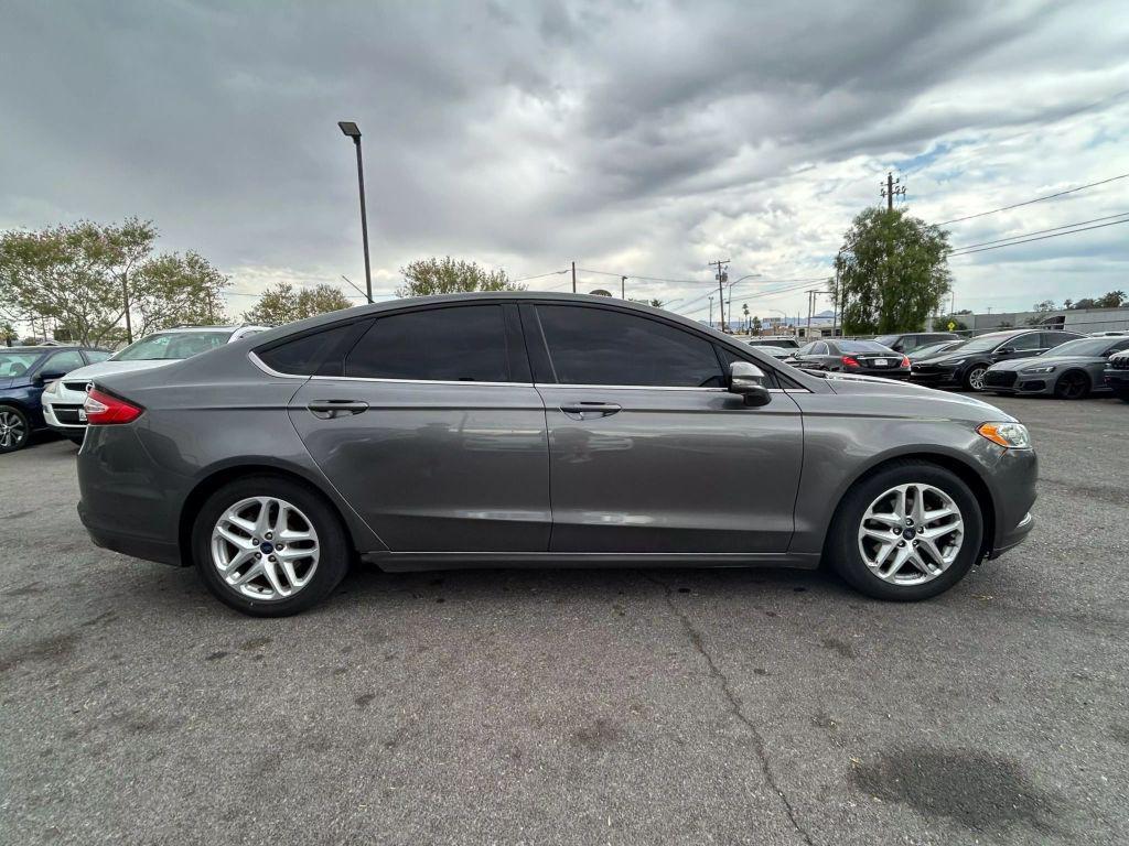used 2014 Ford Fusion car, priced at $4,999