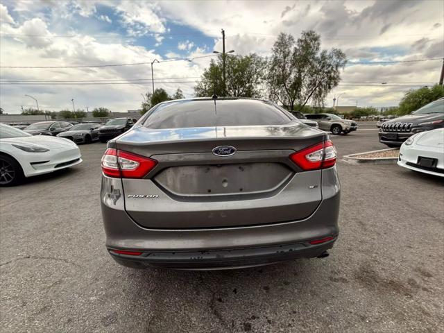 used 2014 Ford Fusion car, priced at $4,999