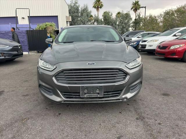 used 2014 Ford Fusion car, priced at $4,999