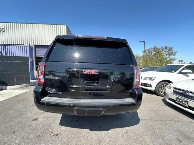 used 2015 GMC Yukon car, priced at $14,999
