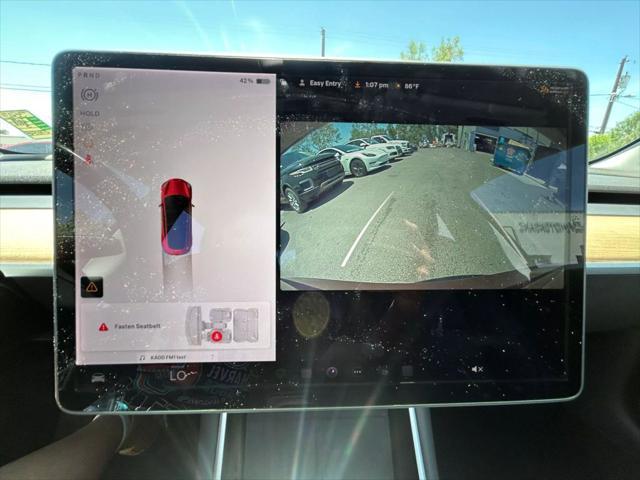 used 2018 Tesla Model 3 car, priced at $15,999