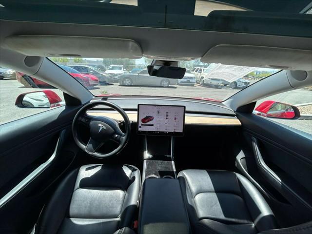 used 2018 Tesla Model 3 car, priced at $15,999