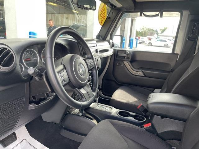 used 2014 Jeep Wrangler Unlimited car, priced at $16,785