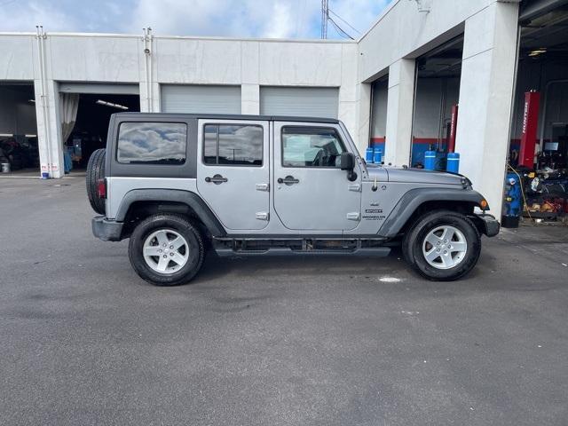 used 2014 Jeep Wrangler Unlimited car, priced at $16,785