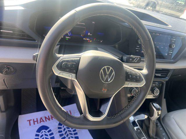 used 2023 Volkswagen Taos car, priced at $24,995