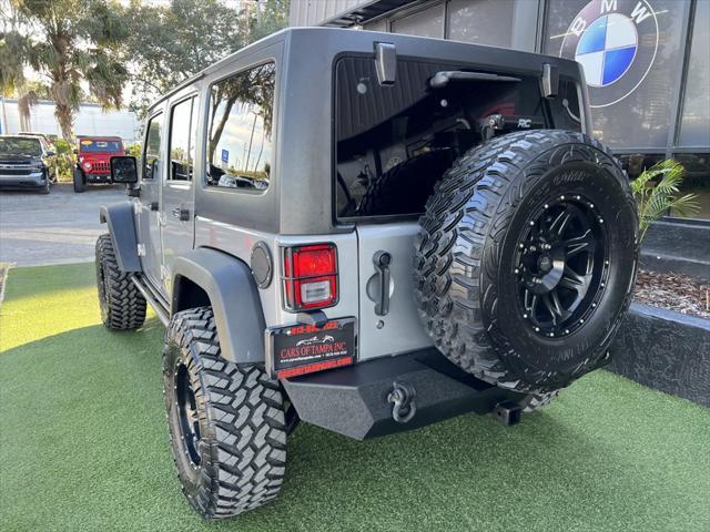 used 2016 Jeep Wrangler Unlimited car, priced at $23,995