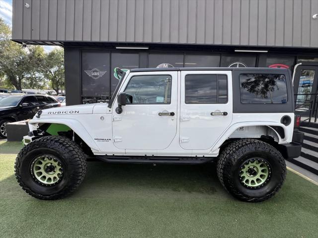 used 2014 Jeep Wrangler Unlimited car, priced at $19,995