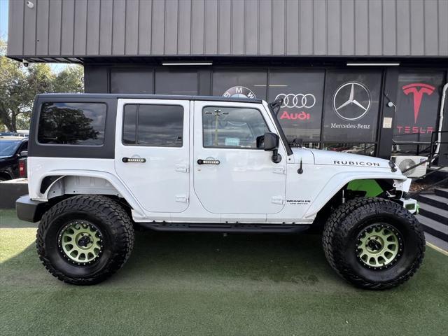 used 2014 Jeep Wrangler Unlimited car, priced at $19,995