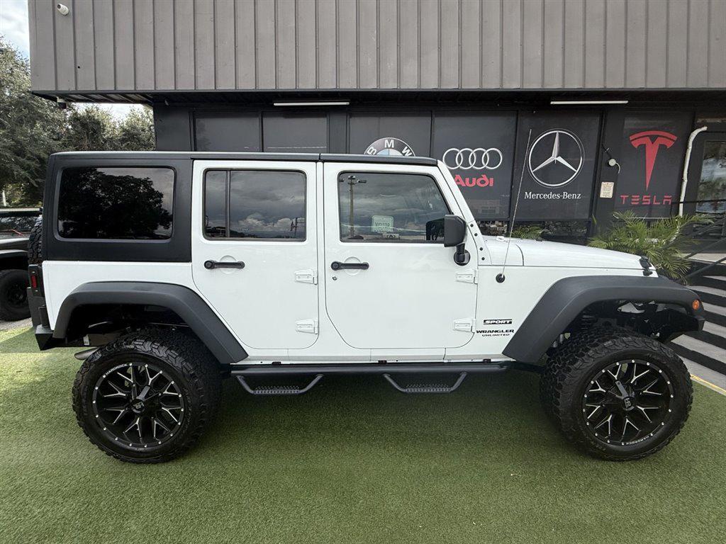 used 2016 Jeep Wrangler Unlimited car, priced at $16,995
