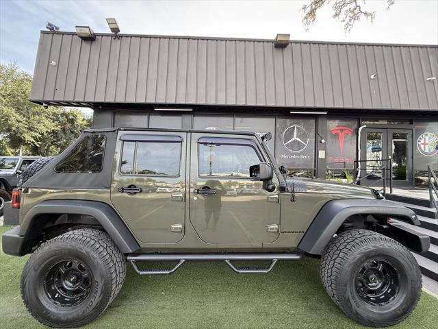 used 2015 Jeep Wrangler Unlimited car, priced at $16,995