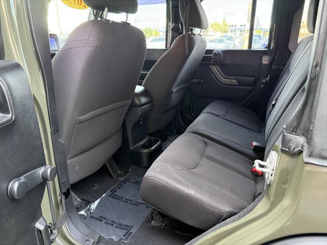 used 2015 Jeep Wrangler Unlimited car, priced at $16,995