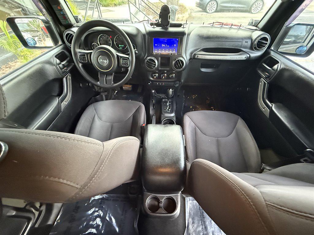 used 2015 Jeep Wrangler Unlimited car, priced at $16,995