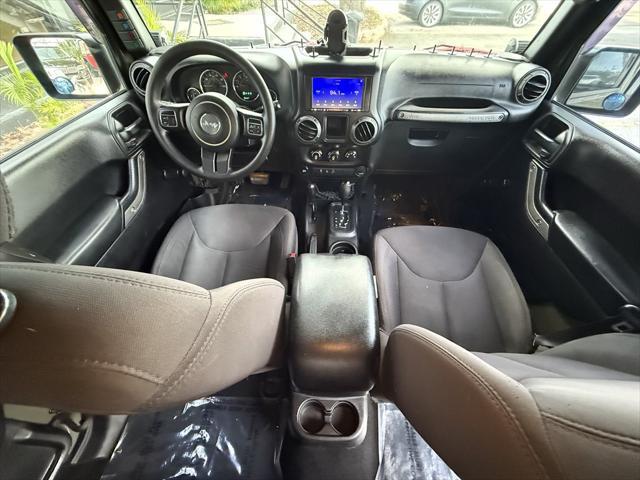 used 2015 Jeep Wrangler Unlimited car, priced at $16,995