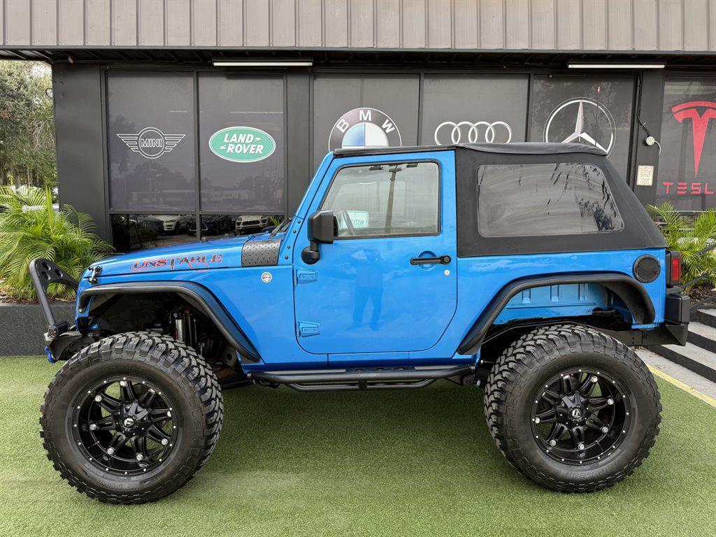 used 2015 Jeep Wrangler car, priced at $16,995