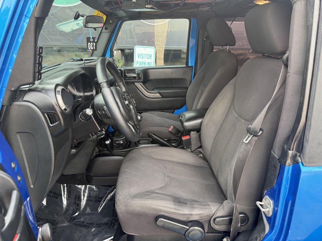 used 2015 Jeep Wrangler car, priced at $16,995