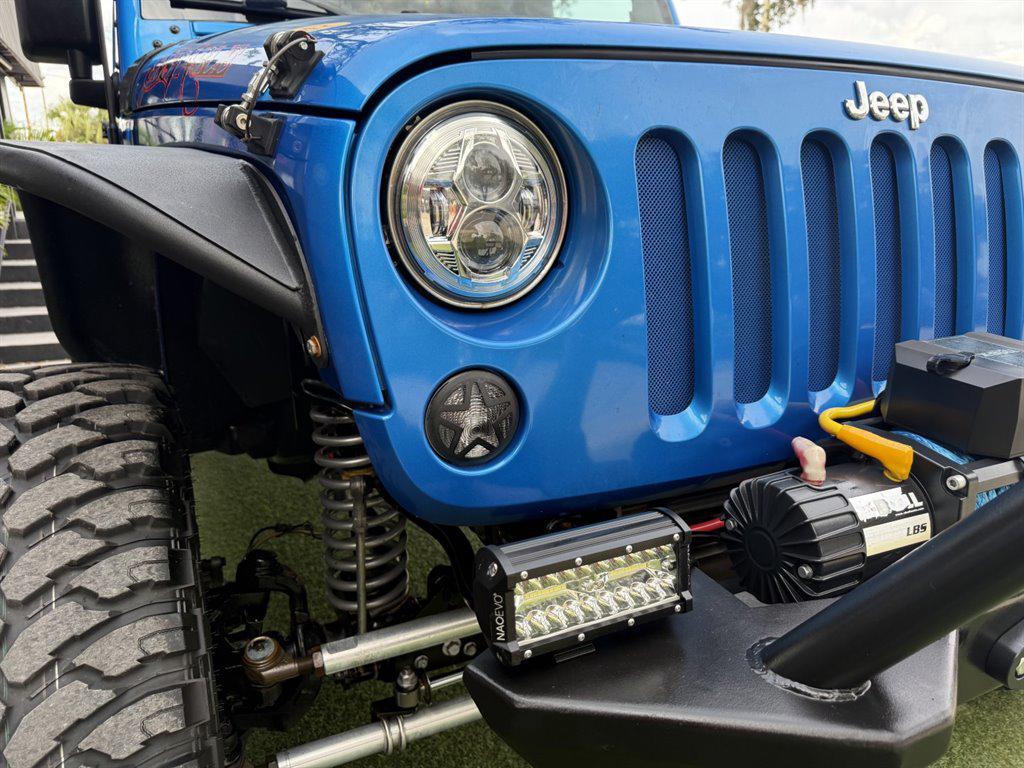 used 2015 Jeep Wrangler car, priced at $16,995