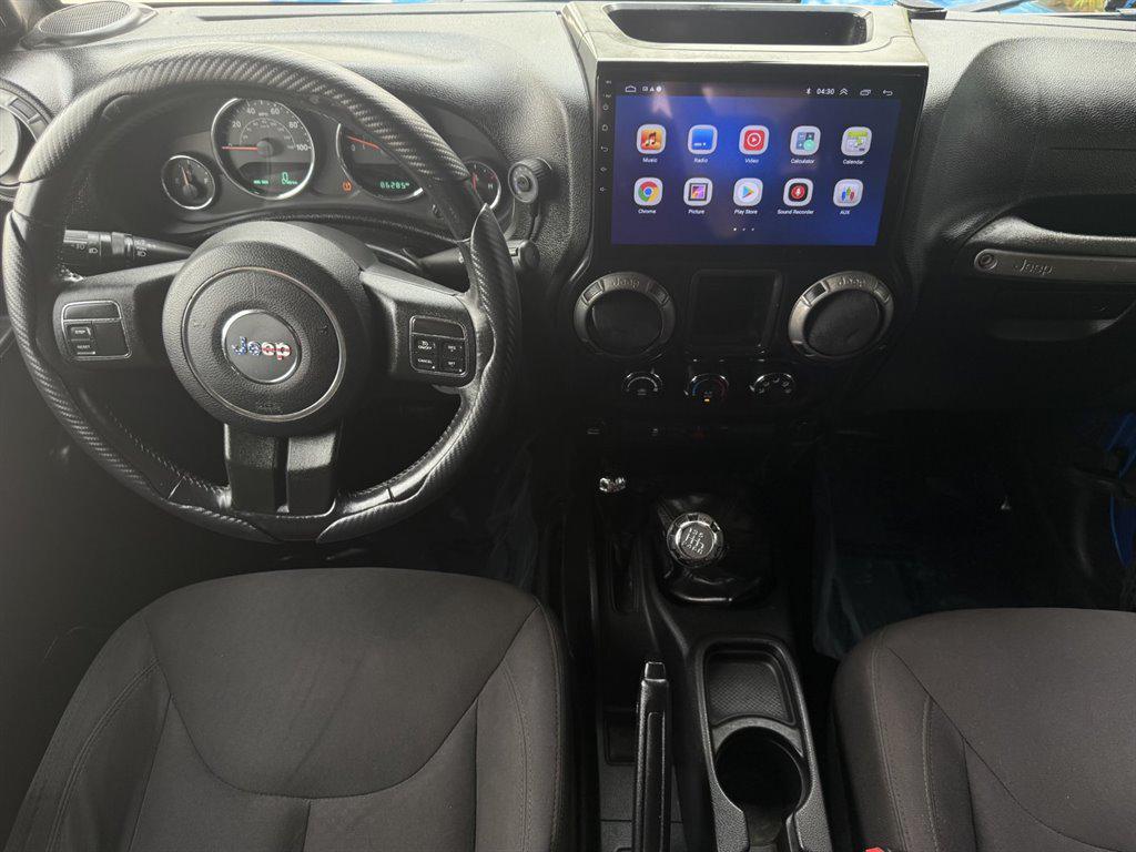 used 2015 Jeep Wrangler car, priced at $16,995