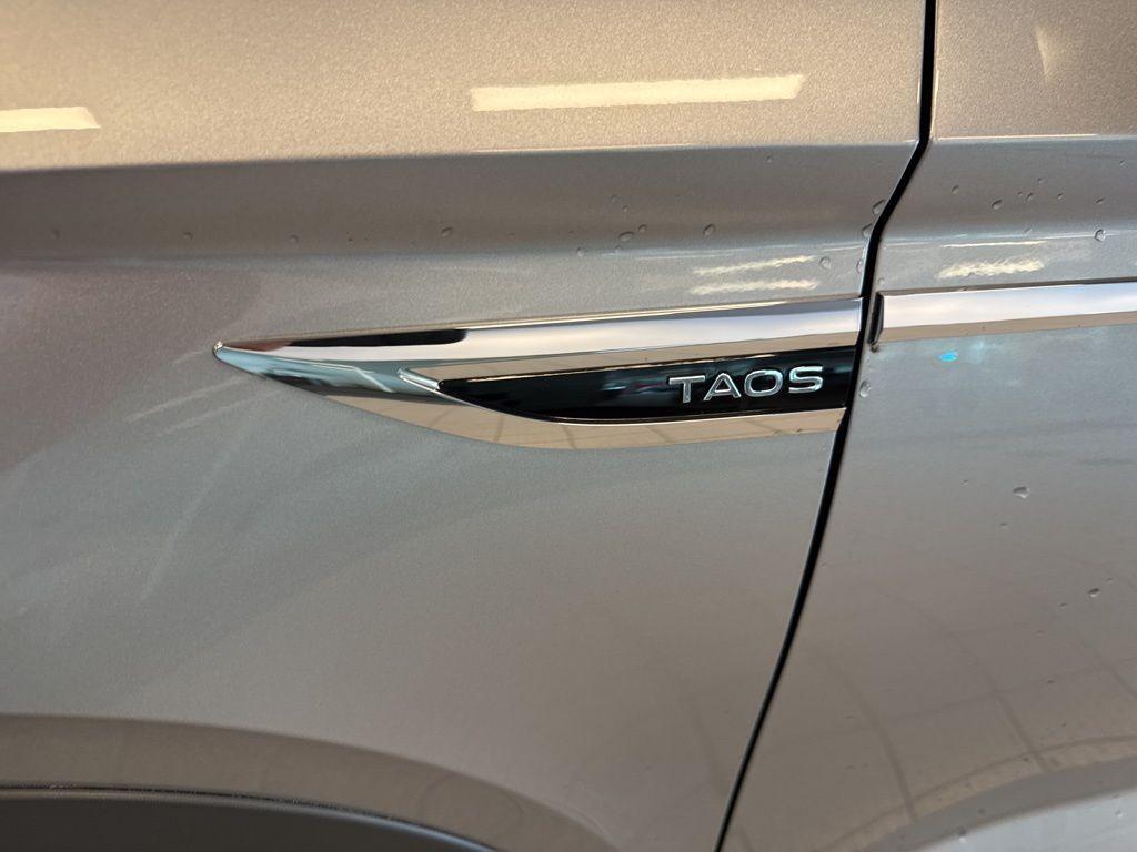 used 2022 Volkswagen Taos car, priced at $19,999