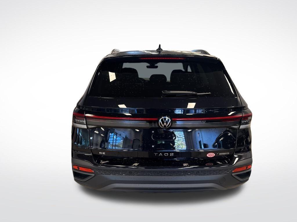 used 2025 Volkswagen Taos car, priced at $30,995