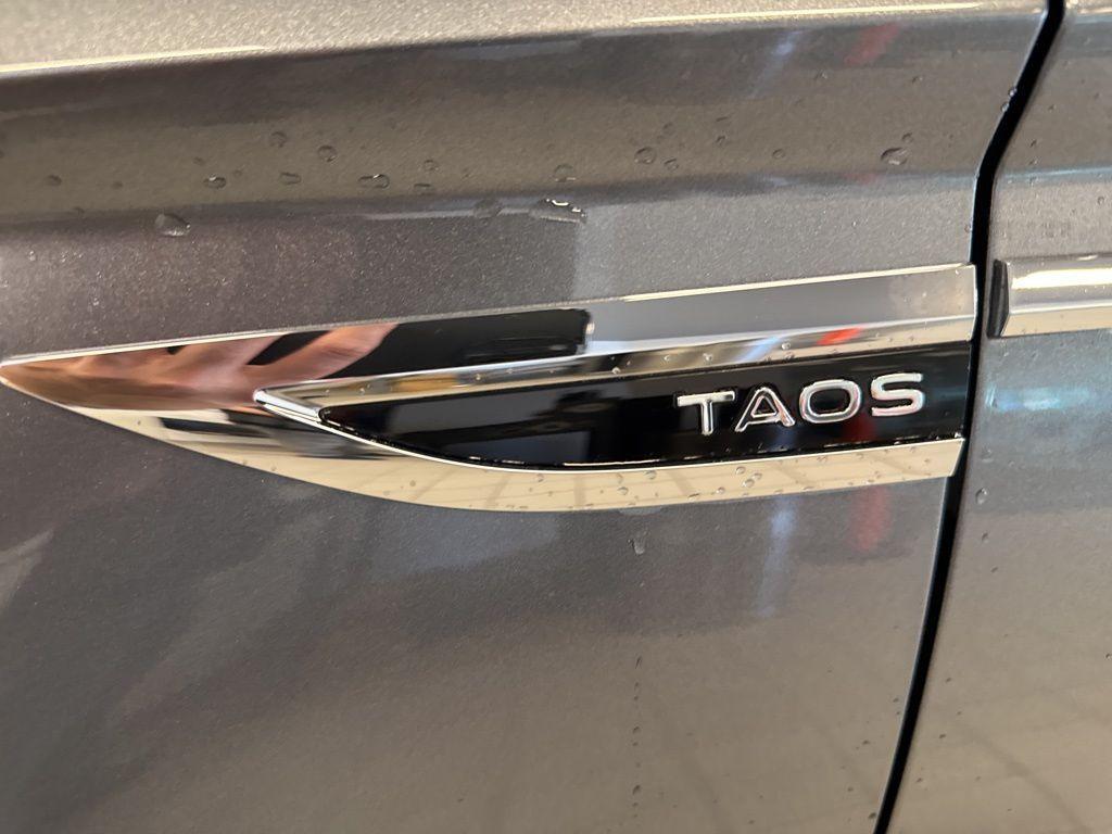 used 2024 Volkswagen Taos car, priced at $24,999
