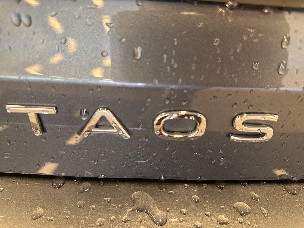 used 2024 Volkswagen Taos car, priced at $24,999