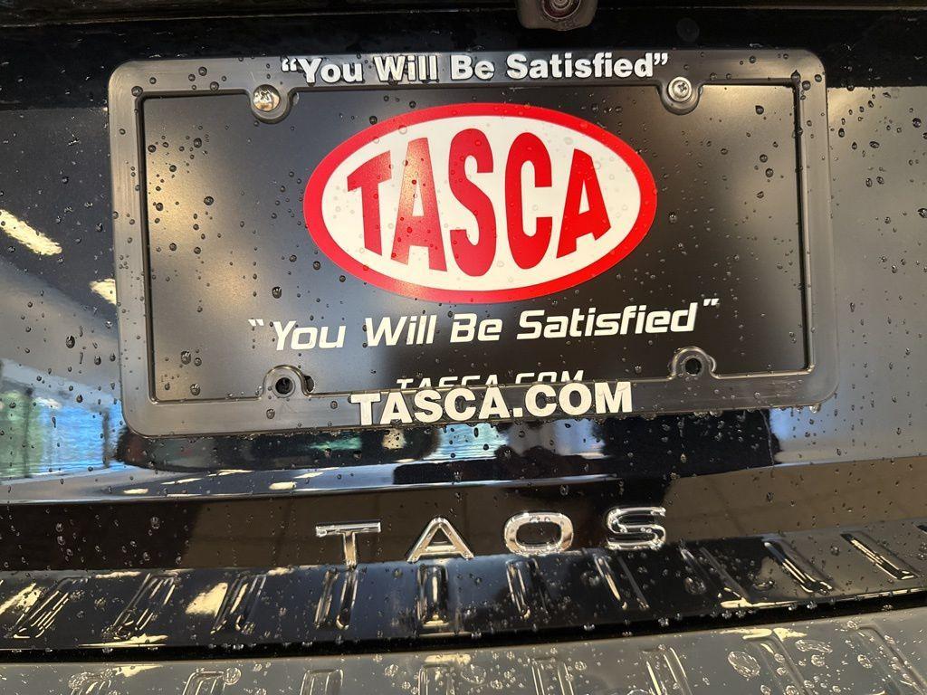 used 2023 Volkswagen Taos car, priced at $21,072