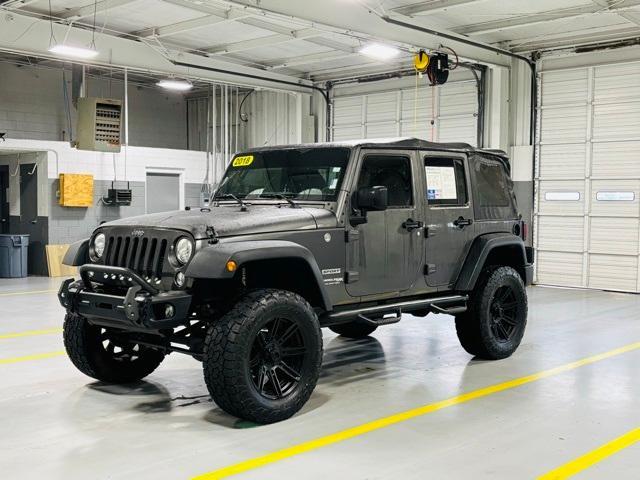 used 2018 Jeep Wrangler JK Unlimited car, priced at $21,500