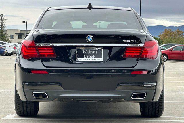 used 2014 BMW 750 car, priced at $16,999