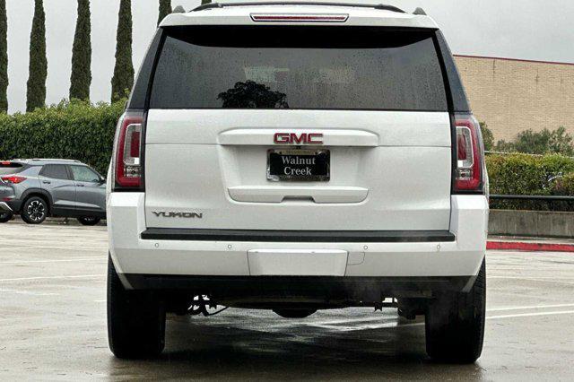 used 2019 GMC Yukon car, priced at $25,999