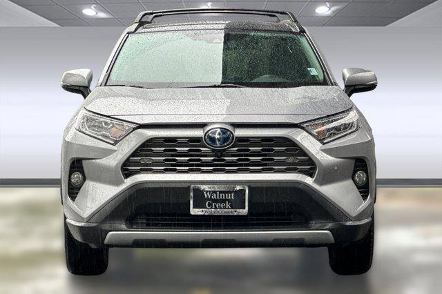 used 2021 Toyota RAV4 Hybrid car, priced at $29,999