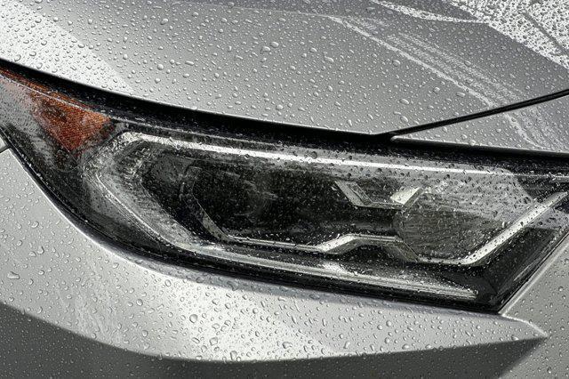 used 2021 Toyota RAV4 Hybrid car, priced at $29,999