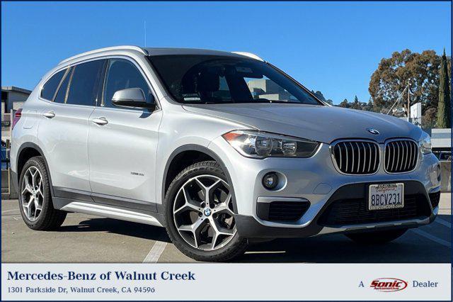 used 2018 BMW X1 car, priced at $12,288