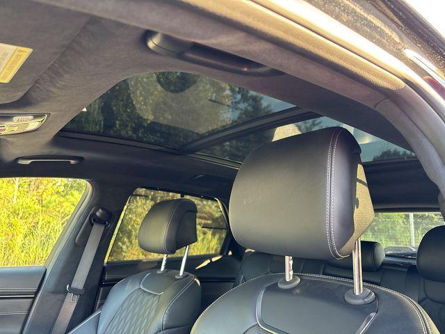 used 2023 Genesis GV70 car, priced at $48,409