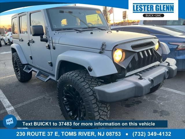 used 2012 Jeep Wrangler Unlimited car, priced at $16,378