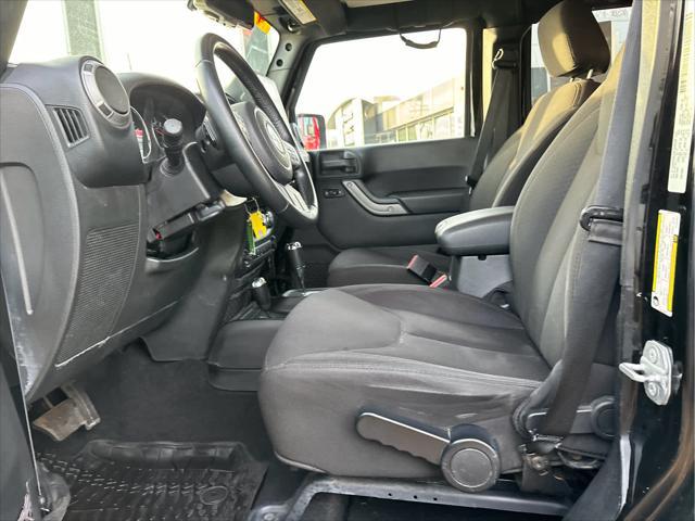 used 2015 Jeep Wrangler Unlimited car, priced at $14,937